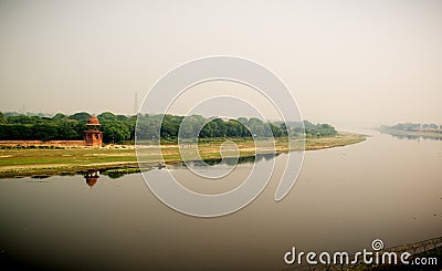 Yamuna river and a man in boat. View from Taj Stock Photo