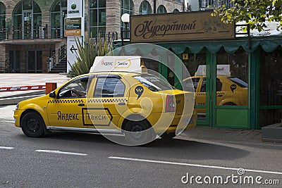 Yandex taxi near the restaurant Resort in Sochi Editorial Stock Photo