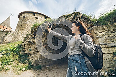 Yang pretty woman tourist in front of castle Stock Photo