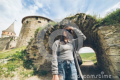 Yang pretty woman tourist in front of castle Stock Photo