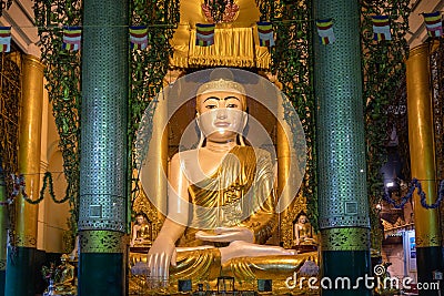 Huge buddha at the Shwedagon pagoda Editorial Stock Photo