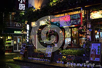 Yangshuo West Street at night, chinese food and night life, night market, Guilin, Guangxi, China Editorial Stock Photo