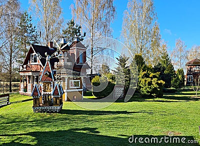 Yard with fabulous small houses on the outskirts of Vecumnieki village in Latvia in the spring of 2022 Editorial Stock Photo