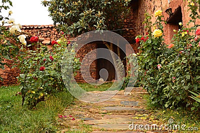 Yard Of Neighbors On The Street Of This Picturesque Village With Its Black Slate Roofs In Madrigera. Architecture Vacation Travel Editorial Stock Photo