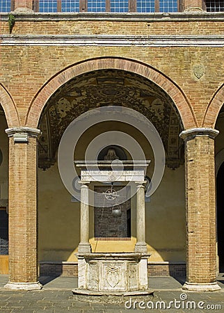 Yard of Palazzo Piccolomini e delle Papesse. Siena, Italy Stock Photo