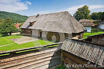 Yard between wooden houses in open air musem near Bardejovske kupele spa resort during summer Editorial Stock Photo