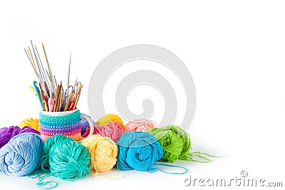 Yarn balls for knitting and hooks, knitting needles. Stock Photo