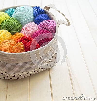 Yarn for knitting rainbow. Wood background Stock Photo