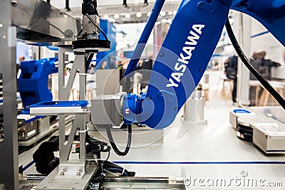 Yaskawa moto mini robot arm on Messe fair in Hannover, Germany Editorial Stock Photo