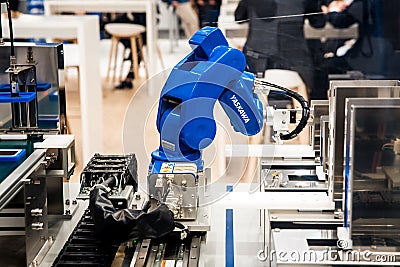 Yaskawa moto mini robot arm on Messe fair in Hannover, Germany Editorial Stock Photo