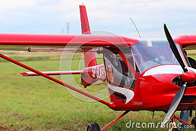 Yaslo, Poland - july 3 2018: Red light two-seater turboprop aircraft of red color. Airshow free time spending time for entertainme Editorial Stock Photo
