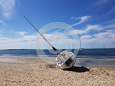 Yatch Yacht shipwrecked on beach Stock Photo