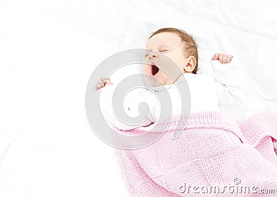 Yawning baby Stock Photo