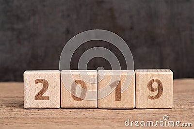 Year 2019 begin concept, simple and minimal cube wooden block bu Stock Photo