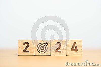 2024 year block with dartboard icon. Goal, Target, Resolution, strategy, plan, Action, mission, motivation, and New Year start Stock Photo
