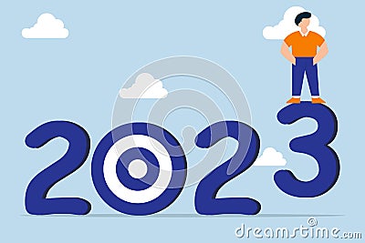 Year 2023 business target. businessman changing year to 2023 target Stock Photo