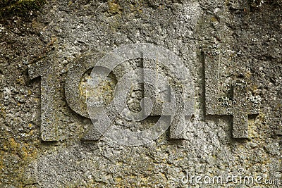 Year 1944 carved in stone. The years of World War II. Stock Photo