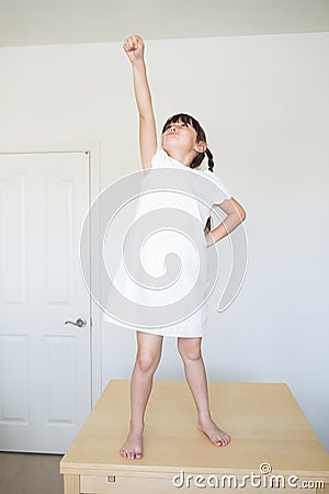 Girl pretending to fly Stock Photo