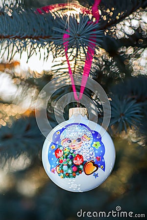 Year of the Sheep Christmas bauble on a Christmas tree branch Stock Photo