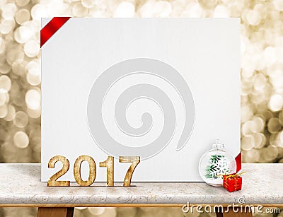 2017 year wood number and white card with red ribbon in perspective room with sparkling bokeh wall on marble table Stock Photo