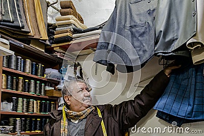 50 years ago working as tailor Editorial Stock Photo