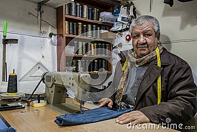 50 years ago working as tailor Editorial Stock Photo