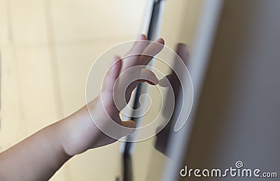 3 years boy using education interactive touch screen Stock Photo