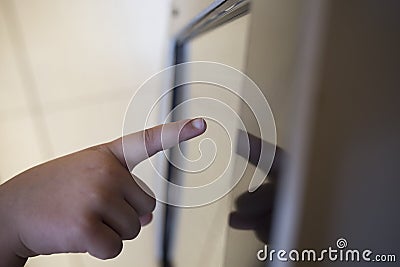 3 years boy using education interactive touch screen Stock Photo