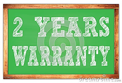 2 YEARS WARRANTY words on green wooden frame school blackboard Stock Photo