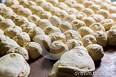 Yeast dough. Buns from dough Stock Photo