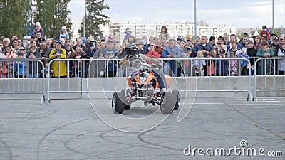 Yekaterinburg, Russia-August, 2019: Man on Quad bike performs tricks. Action. Professional stunt rider on Quad bike Editorial Stock Photo