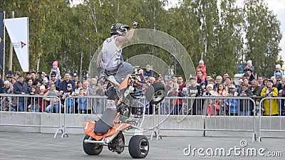 Yekaterinburg, Russia-August, 2019: Man on Quad bike performs tricks. Action. Professional stunt rider on Quad bike Editorial Stock Photo