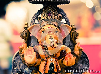 Yello Ganesh Elephant God in Hindusim mythology in rich king pos Stock Photo