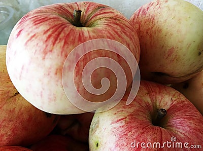 Yellow apples with pink stripes on the peel ripe Stock Photo