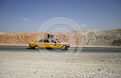 Yellow arab taxi Stock Photo