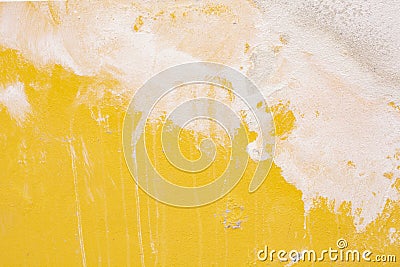 yellow background with white paint on top Stock Photo