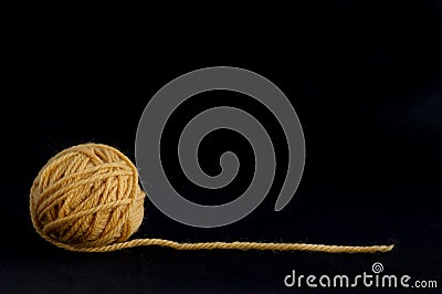 Yellow ball with yarn Stock Photo