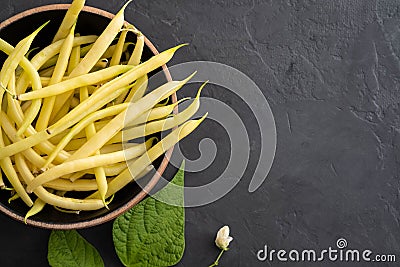 Yellow bean, organic vegetables from farmer market, farm fresh beans on plate, vegan food concept. Stock Photo