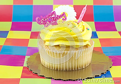 Yellow Birthday Cupcake Stock Photo