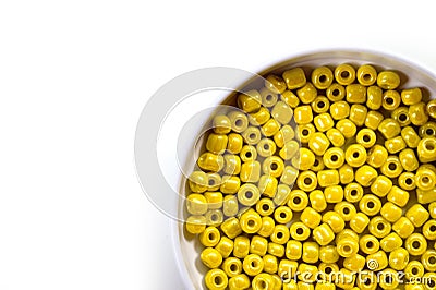 Yellow beads for needlework, used to make bracelets, beads and other jewelry Stock Photo