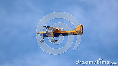 a yellow and blue plane Editorial Stock Photo