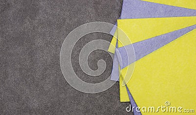Yellow and blue square rags for cleaning, dusting on a gray background. Free space for text. Stock Photo