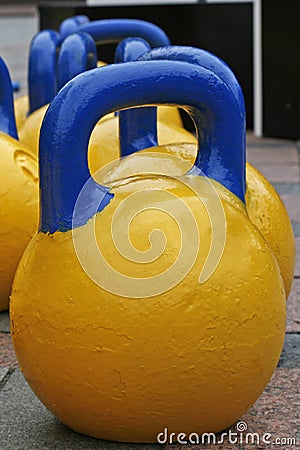 Yellow-blue weights for sport Stock Photo