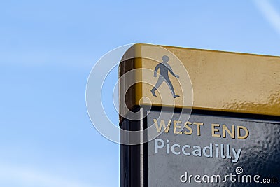 Yellow and blue West End Piccadilly sign on clear sky. Place for text Editorial Stock Photo