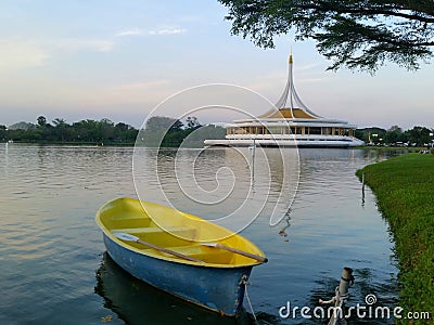 yellow Boat on the lake Stock Photo