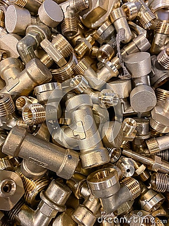 Yellow Brass Scrap nuts and bolts ready to be recycled Stock Photo