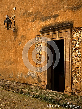 Yellow Brown Adobe Wall and Door Plus Lantern Stock Photo