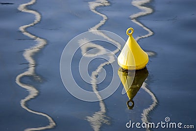 Yellow buoy Stock Photo