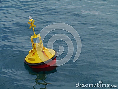 A yellow buoy in the Mediterannean Stock Photo