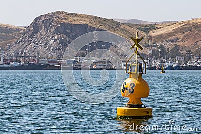 Yellow Buoy in Port of Ensenada Stock Photo